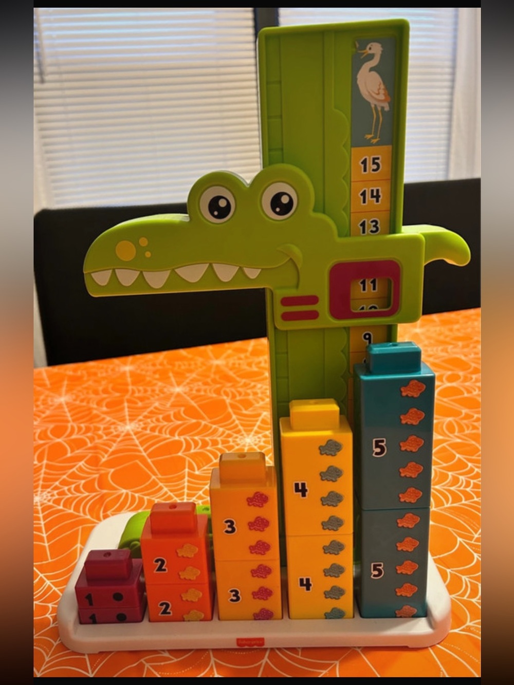 Fisher-Price Green Crocodile Counting Stacker with Colorful Numbered Blocks